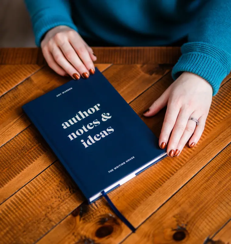 A Writing House notebook titled author notes and ideas